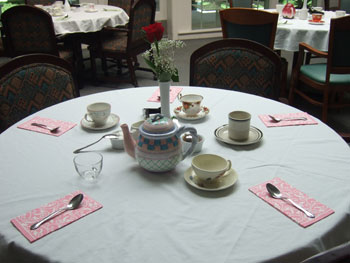 Tables set for Mother's Day tea Tables set for Mother's Day tea